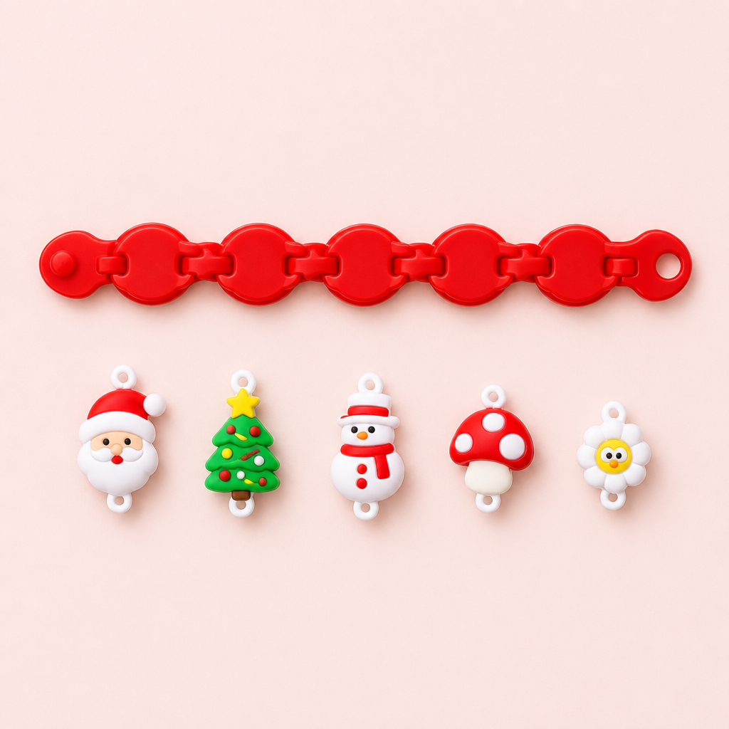 Christmas bracelet and charms arranged in a flat lay