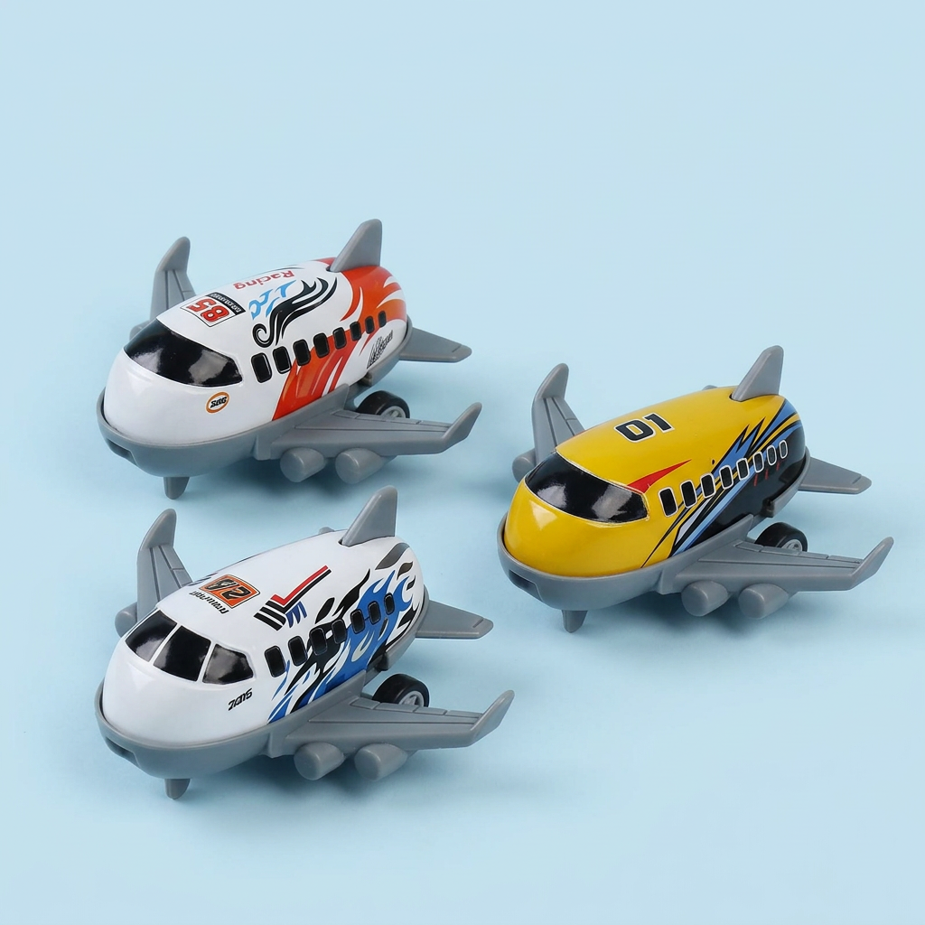 Close-up of three differently decorated toy planes